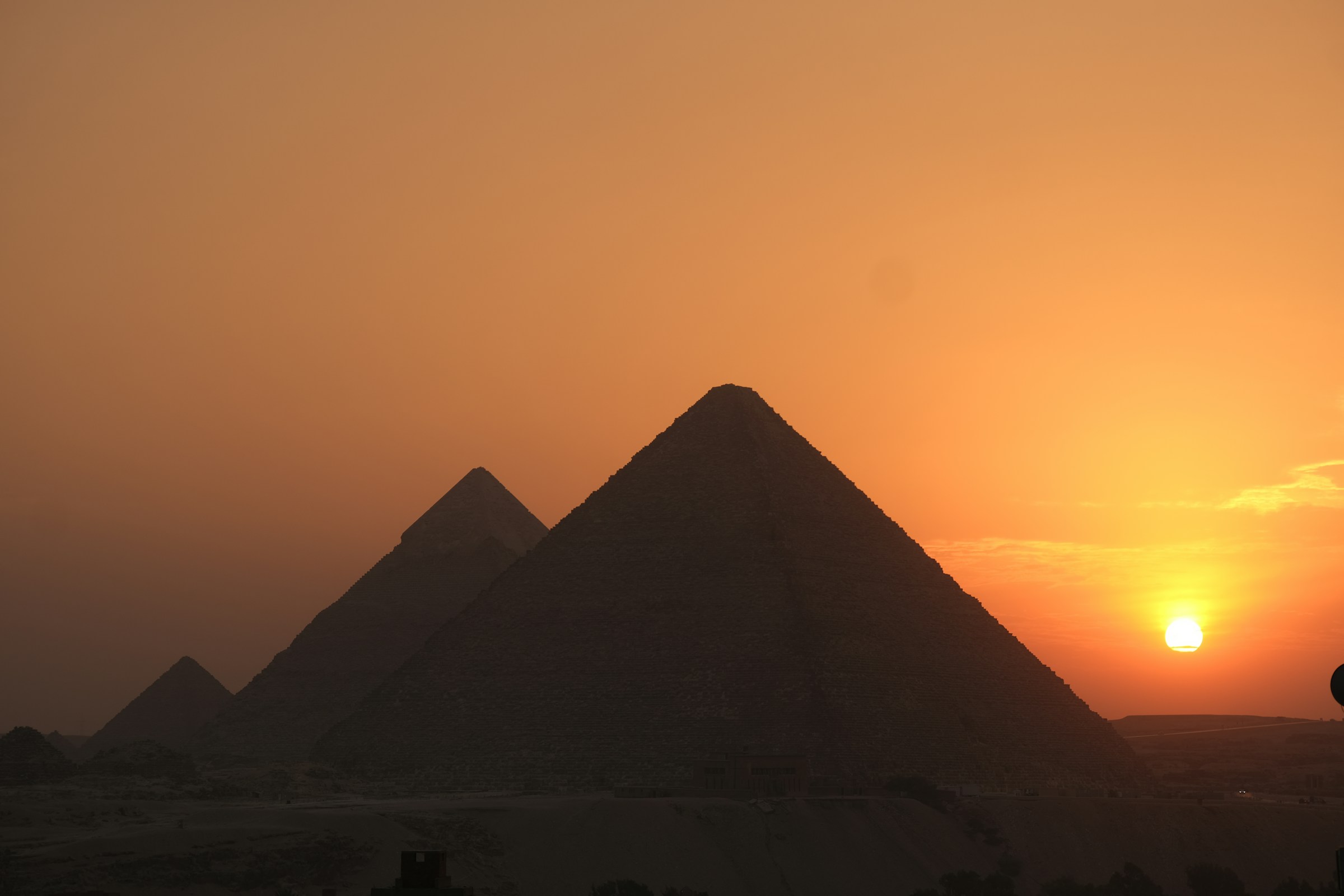 Sunset over the pyramids of Giza
